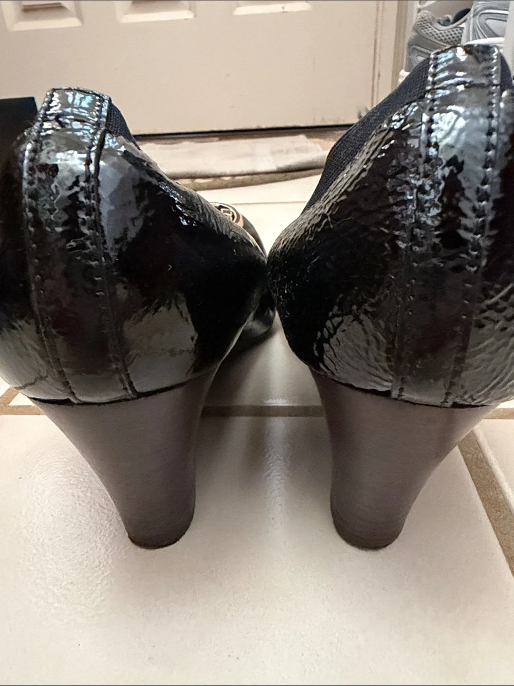 Tory Burch Black Patent Leather Heels with Gold Logo Medallion